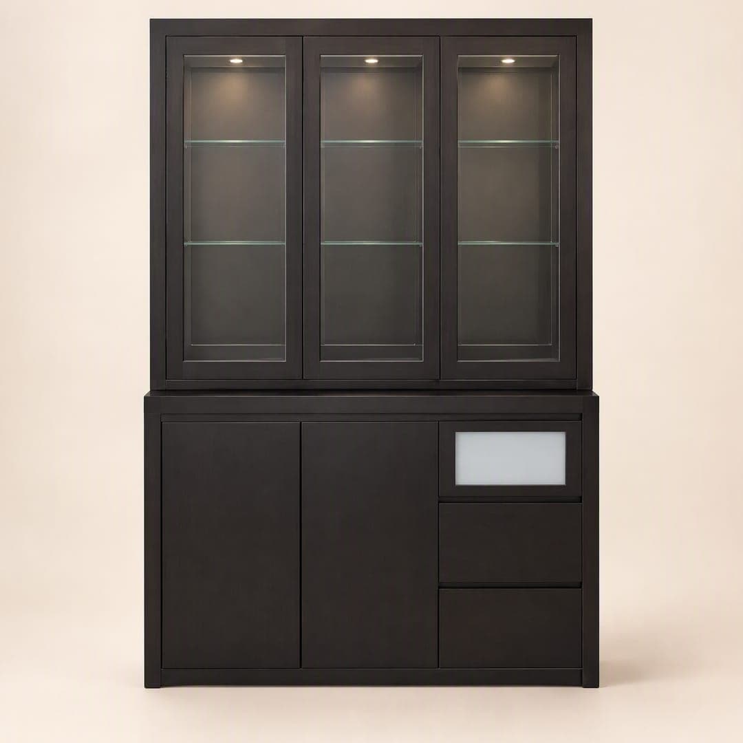 A dark hutch with lit glass-door cabinets over a cupboard and drawer base