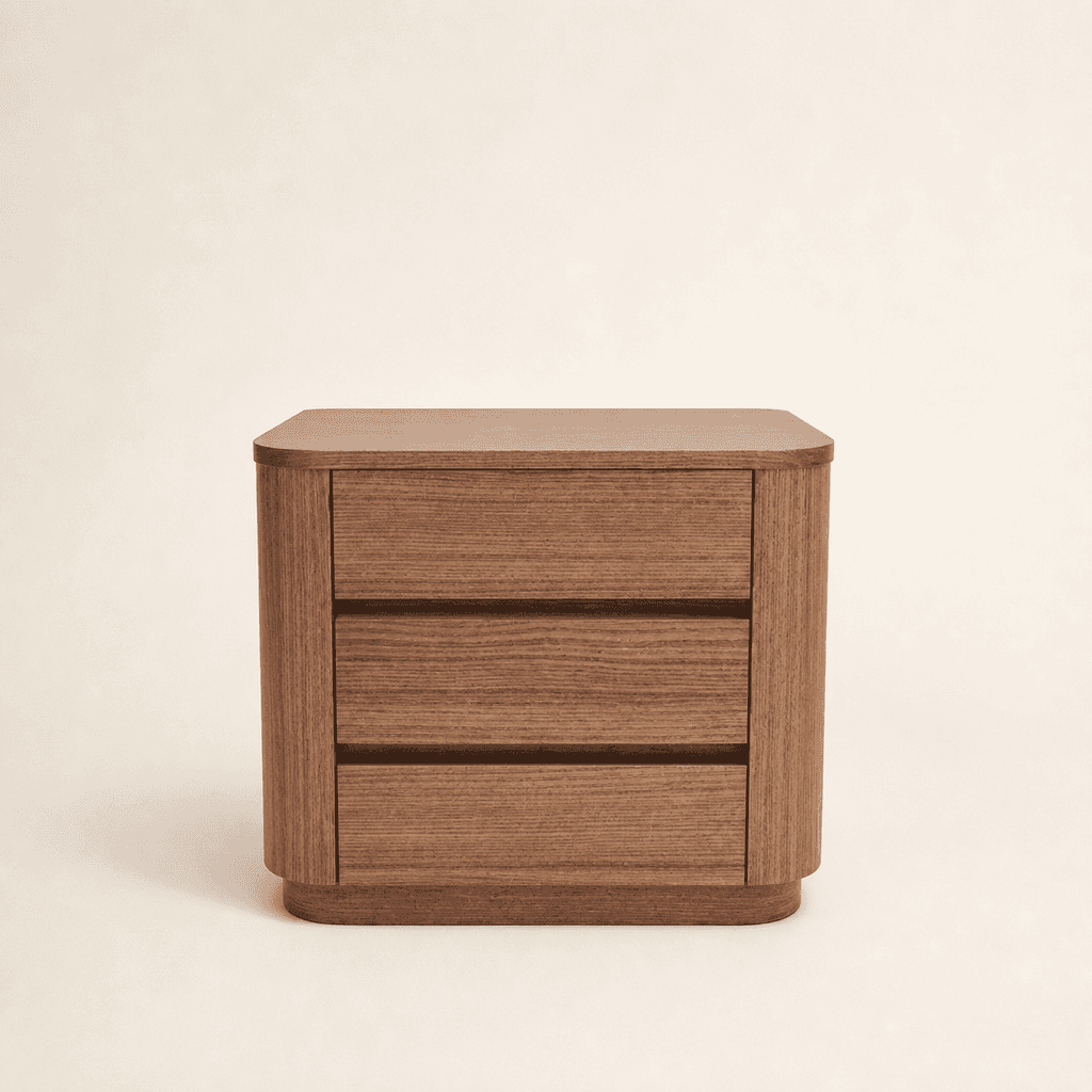 The Freycinet Bedside, a rounded Tasmanian Oak bedside with three drawers on a low shadowline plinth